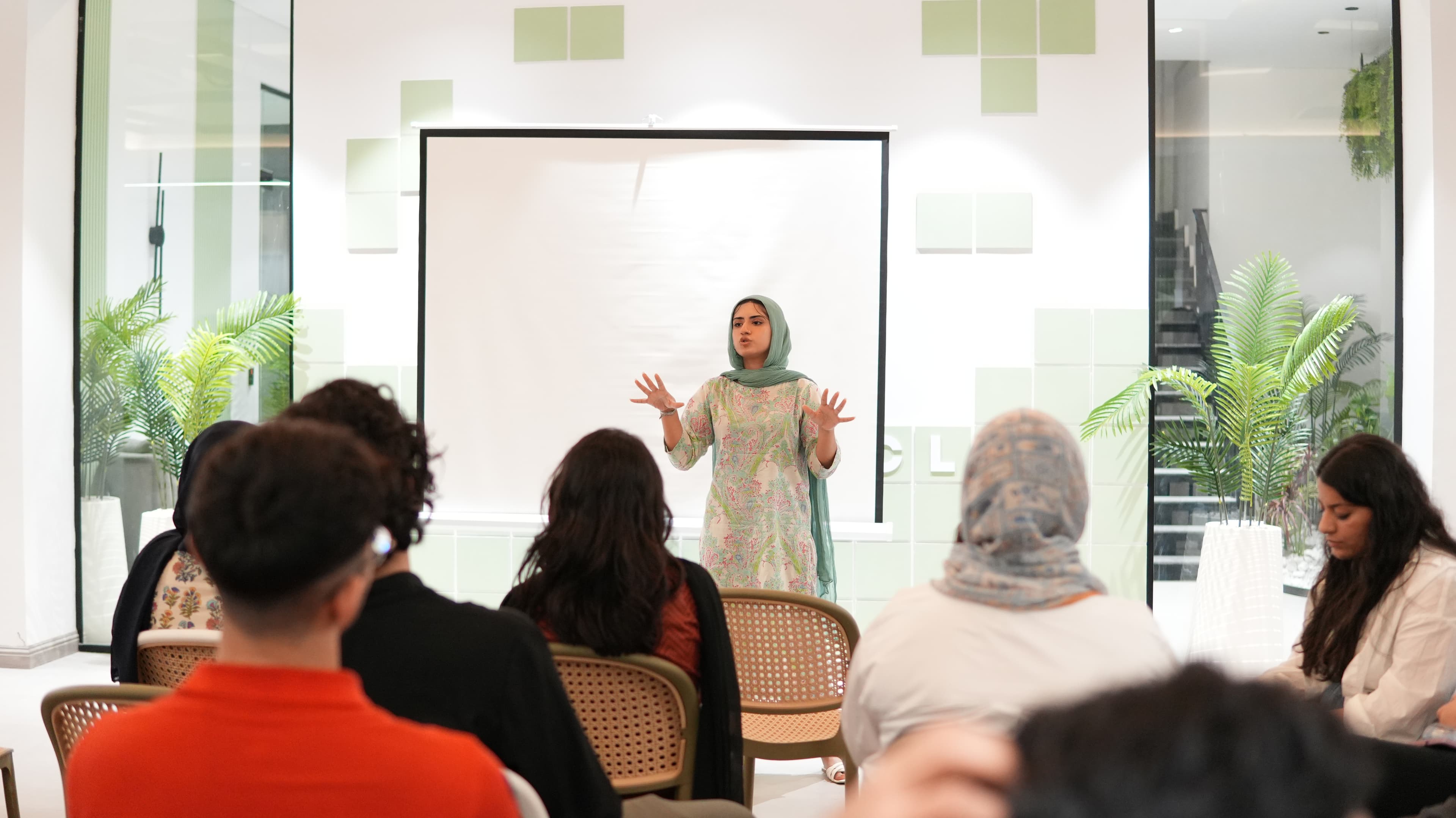 A presentation taking place in The Cubicle event space